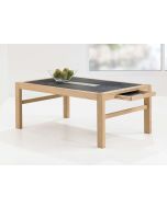 Sofabord med kakler og skuffer.